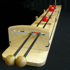 Le jeu traditionnel en bois du rolling-ball