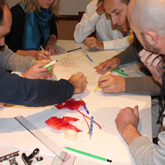 Séance de peinture pendant le team building fresque